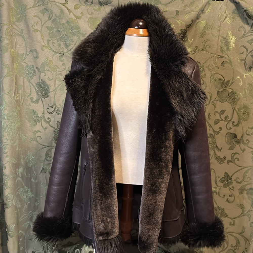 Chocolate brown lined soft zippered jacket has pockets